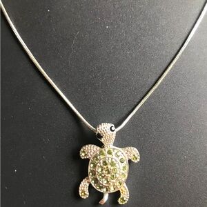 Light silver color necklace with rhinestone turtle